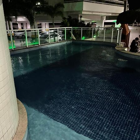 Apartamento com varanda e piscina Cabo Frio Esterno foto